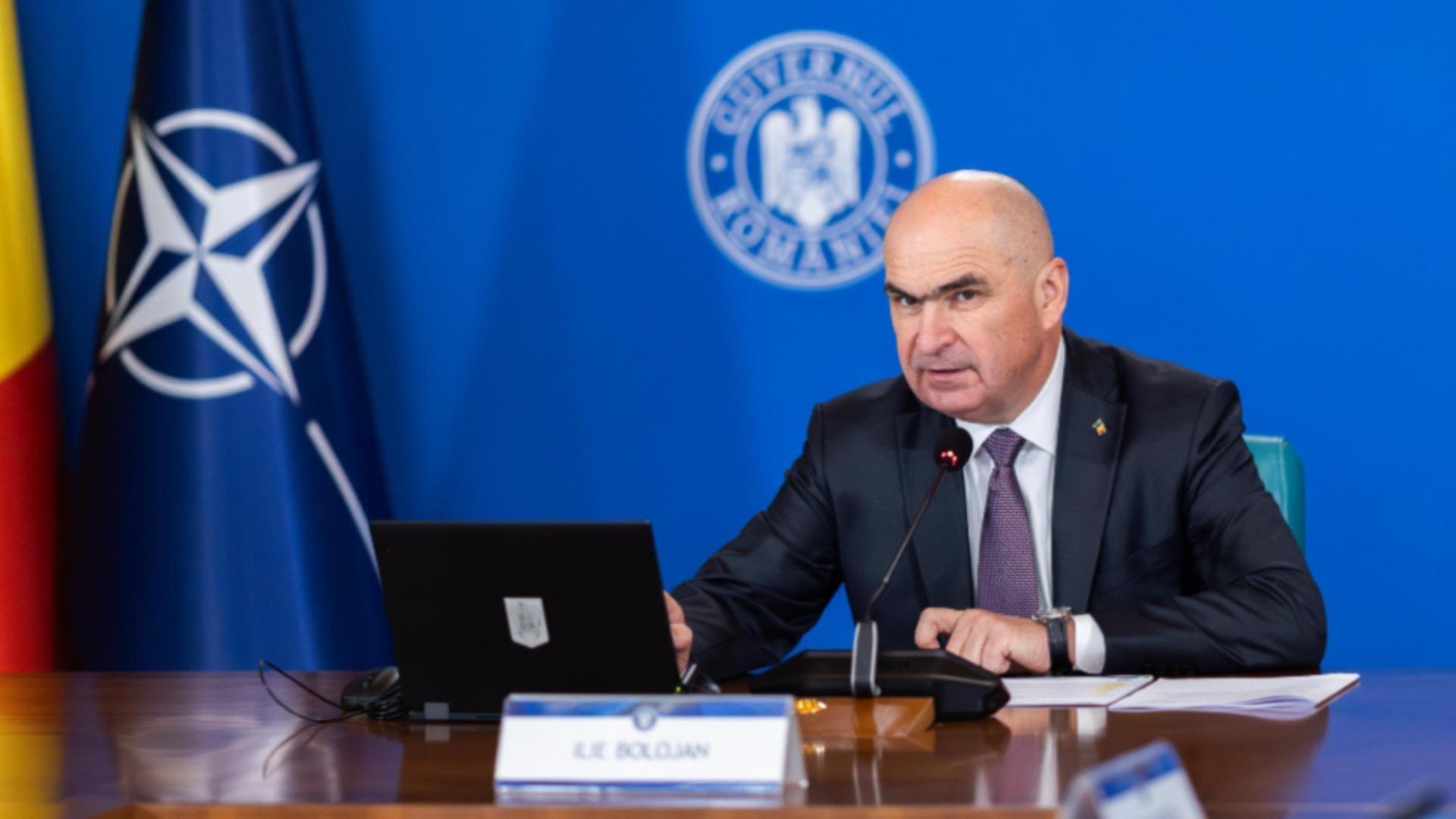 Bolojan ingheata salariile intalnire esentiala la Guvern